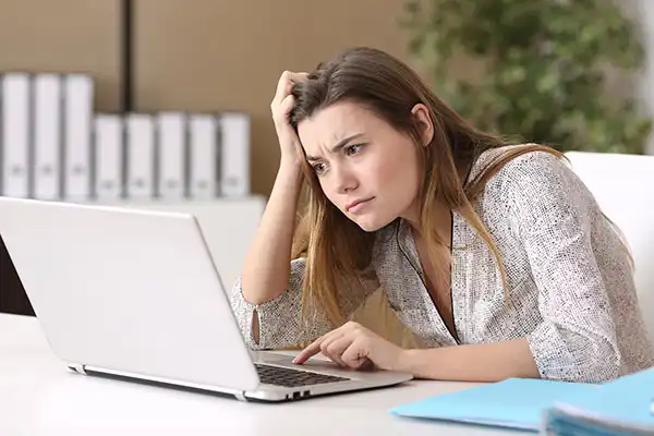 Student struggling on computer